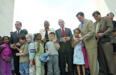 Arch is rededicated, as mayor
