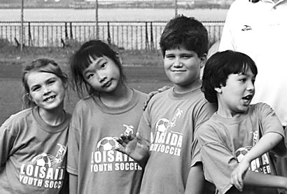 East Side kids learn soccer