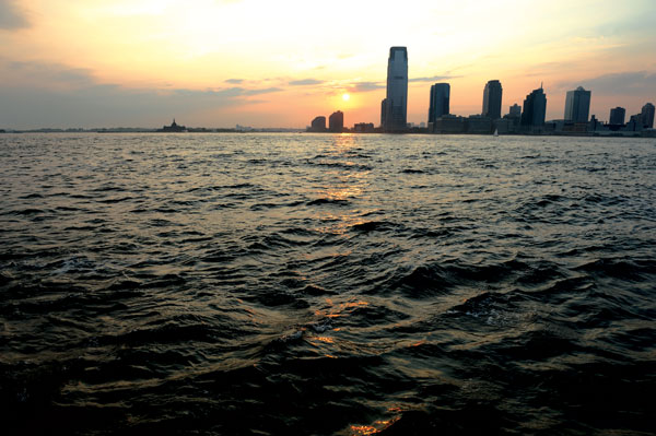 A view in August across the Hudson River to Jersey City from Lower Manhattan. Water levels have already risen due to climate change, according to experts.
