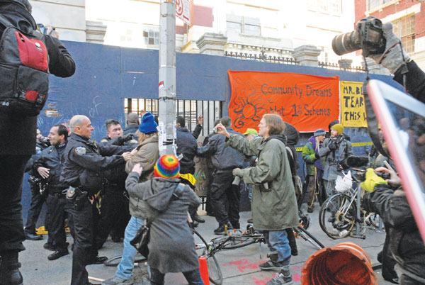 ‘Tear down this wall!’ activists cry outside CHARAS 1 charas,-melee
