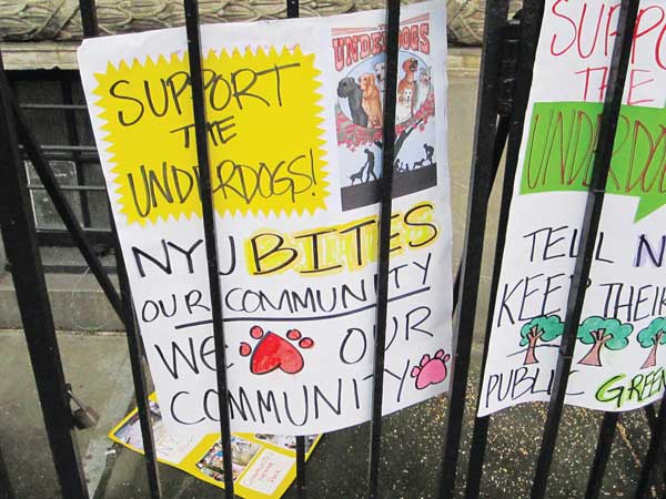 Angry faculty to caped dogs unite at anti-N.Y.U. plan rally 1 underdogs-sign