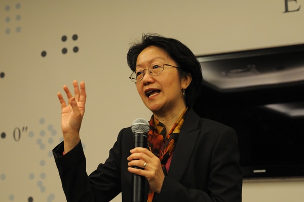 Councilmember Margaret Chin at a tree mulching event two weeks ago in Bowling Green.  Downtown Express photo by Milo Hess