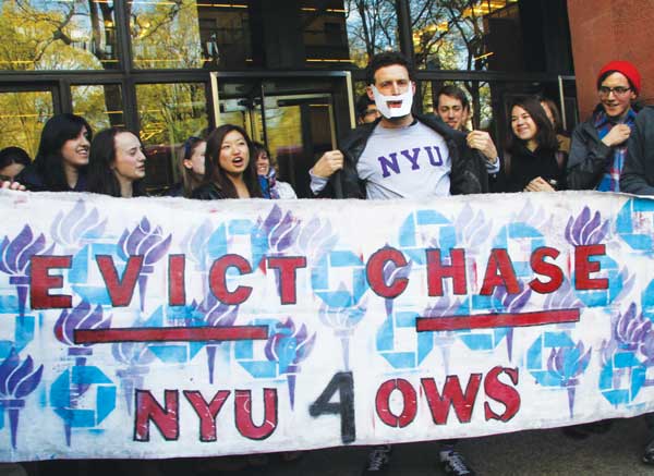 Robert Aschermann, a SLAM organizer, speaking at the Sept. 18 protest.   Photo by Yannic Rack