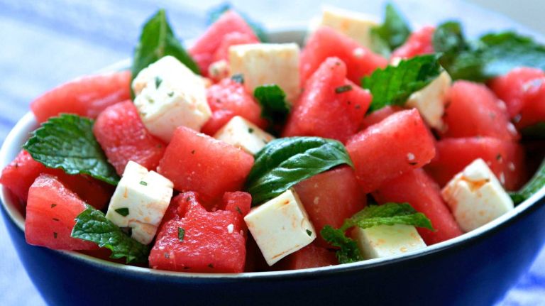 <b>WHAT YOU'LL NEED</b>:<br> 1 (3-pound) seedless watermelon, rind removed, cut into 1-inch cubes (4 cups)<br> 1/4 cup whole mint leaves<br> 1/4 cup whole basil leaves<br> 2 tablespoons parsley, chopped<br> 1 tablespoon lime juice<br> 1 tablespoon raspberry vinegar<br> 1/2 teaspoon salt<br> 1 tablespoon extra-virgin olive oil<br> 4 ounces feta, diced (about 1 cup)<br><br> <b>HOW TO</b>:<br><br> 1. Combine the watermelon, mint and basil in a large bowl.<br><br> 2. Whisk together the parsley, lime juice, raspberry vinegar, salt and oil. Gently place in the feta; toss with the watermelon mixture. Makes 4 servings.