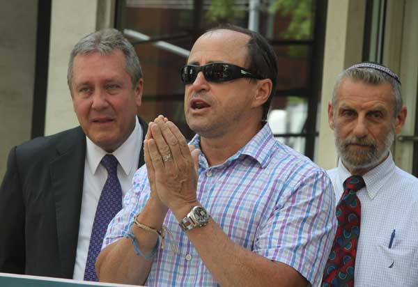 Photo by Tequila Minsky Activist Allen Roskoff spoke at a rally last August outside 186 Spring St., which was facing demolition. The city’s Landmarks Preservation Commission refused to save the building, and it was razed soon afterward.