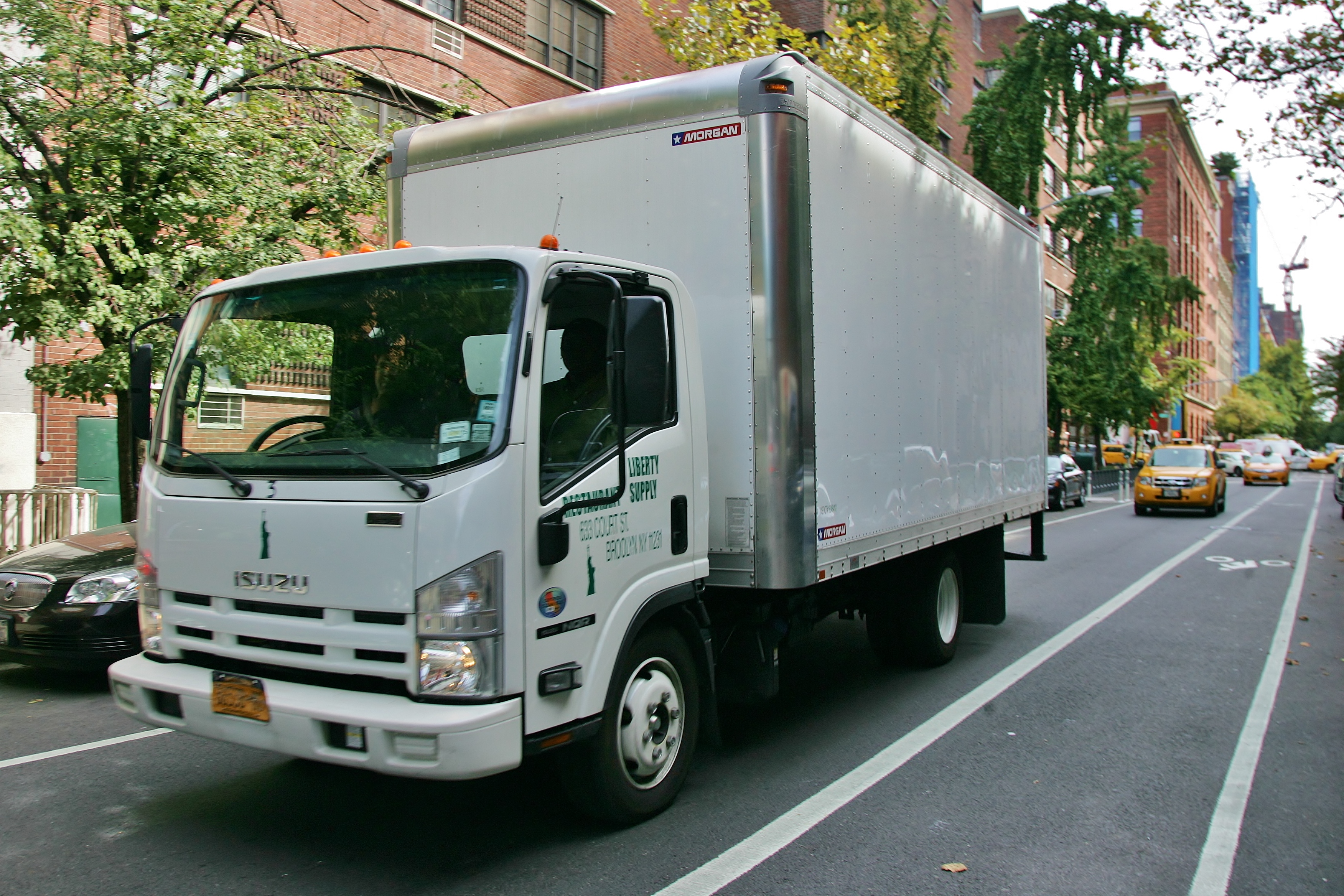 Neighbors say this truck, parked outside Mrs. Green’s, was used to store garbage before pickups.