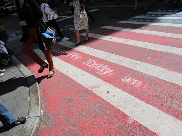 Wittnessing the collapse of the South Tower on 9/11 1 Someone painted the crosswalk at Prince St. and Broadway with a red-white-and-blue American flag pattern and the message “Live For Today 9/11.” At least it didn’t say, “Shop For Today.” Photo by Scoopy