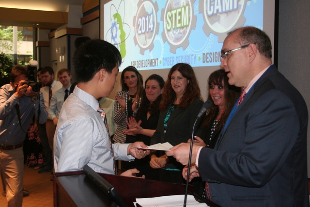 Millennium High School's Jeremy Eng with Pace University's Jonathan Hill at Pace's STEM Collaboratory Camp last month. Downtown Express photo by Yannic Rack.