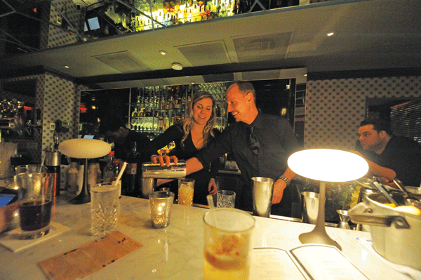 Megan Mayes and Jerry Glaab serving cocktails at The Black Hound, Battery Park City’snewest cocktail lounge and bar adjacent to SouthWest NY at 301 South End Ave.
