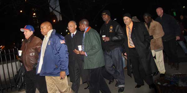 From left, Norman Siegel, state Senator Eric Adams and Bill Thompson led the vigil marchers onto the bridge from the Manhattan side.  Photos by Tequila Minsky 