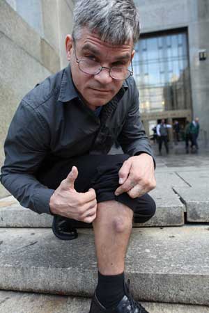 Cro-Mag thrashes the rap 2 Harley Flanagan outside Manhattan Criminal Court on Sept. 27 of this year. Photo by Jefferson Siegel
