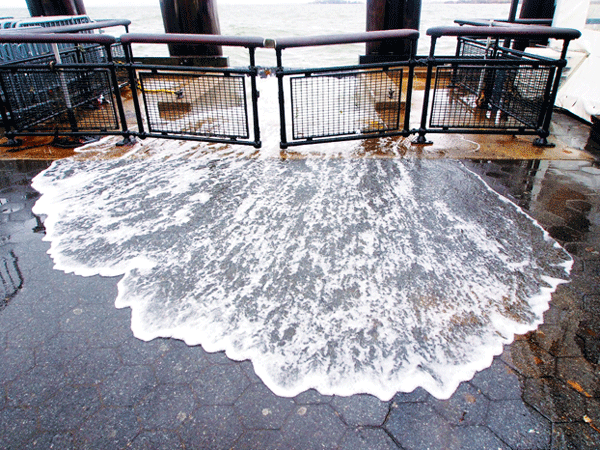 Flooding in Battery Park after Hurricane Sandy. Downtown Express file photo by Milo Hess.