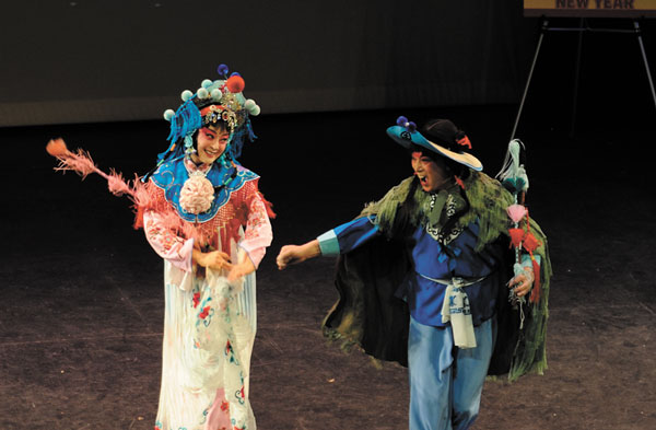 Performers from the New York Chinese Opera Society welcomed the Year of the Snake at Pace University with a scene depicting the flirtation between a country lad and a well-to-do maiden.  Downtown Express photo by Terese Loeb Kreuzer 