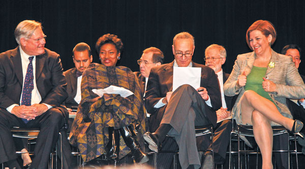 From left, in the front row onstage at Brad Hoylman’s swearing-in ceremony, former state Senator Tom Duane; Andrea Stewart-Cousins, the new state Senate Democratic Conference leader; U.S. Senator Chuck Schumer; and City Council Speaker Christine Quinn.   Photos by Tequila Minsky