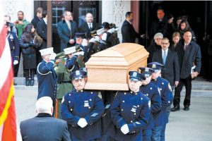 Ed Koch, Village pol who became mayor, dies at 88; A liberal turned centrist 3 Ed Koch’s casket was borne out of Temple Emanu-El on Monday to the jaunty strains of “New York, New York” on the synagogue’s organ and a standing ovation by the 2,000 people in attendance. It certainly was a fitting tune for the colorful, larger-than-life former mayor. See inside for extensive coverage on Koch. Photo by Lorenzo Ciniglio