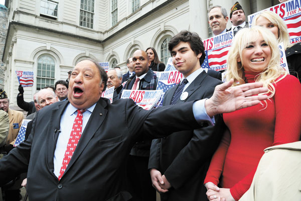 John Catsimatidis announced his mayoral run last week at a press conference on the City Hall steps. At right, behind him, are his son, John Jr., and daughter, Andrea. Photos by Jefferson Siegel 