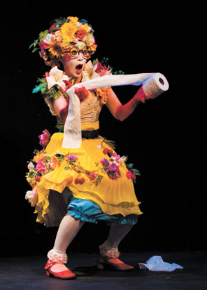 Tokyo-based clown Shoshinz (whose name translates into “shy timid people”) performs “A Day in the Life of Miss Hiccup” — a mysterious figure whose solitary existence is accompanied by a raucous cast of sounds and music that make her life an absurd adventure.    Photo by Rene Ferrer 