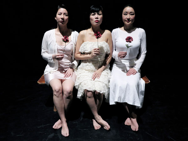 L-R: Kira Onodera, Victoria Linchong and Katherine Yew, in “Big Flower Eater.”   Photo by Jonathan Slaff