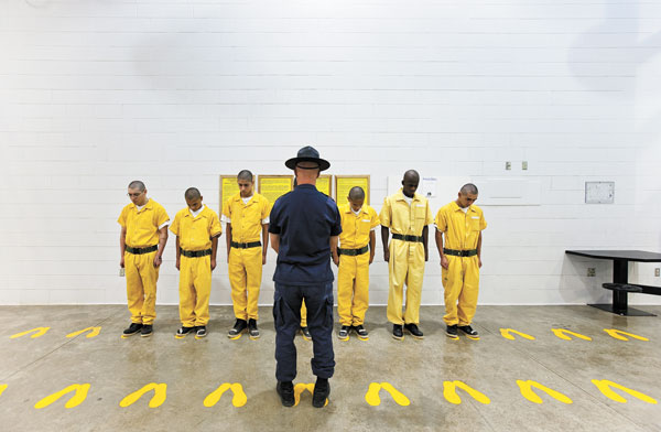 Youthful offenders and a marble renderer 1 Richard Ross: “Orientation Training Phase, Youth Offender System, Pueblo, Colorado, 1” (2010, Digital Inkjet Print, 24”x38”). Orientation Training Phase (OTP), part of the Youth Offender System (YOS) Facility in Pueblo, Colorado. OTP performs intake and assessment of convicted kids and is set up to run like a boot camp, with staff yelling at kids all the time. All of the kids at OTP have juvenile sentences with adult sentences hanging, meaning that if they mess up, they will have to serve their adult sentence. For example, a juvenile could be the reserving a two-year juvenile sentence with 15 years hanging. Courtesy Ronald Feldman Fine Arts, New York