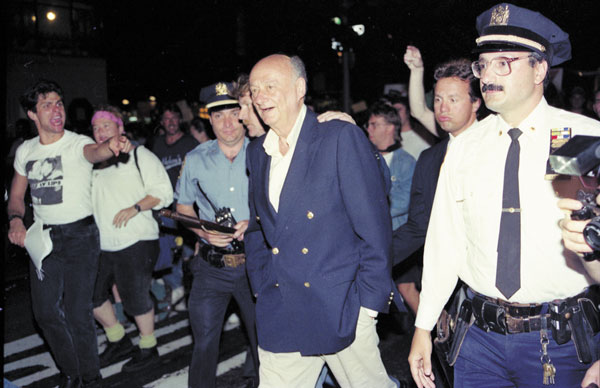 ACT UP marchers confronted and yelled at former Mayor Ed Koch as he tried to return to his home at Two Fifth Ave. in 1990.