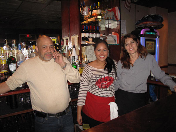Photo by Clayton Patterson At El Sombrero, from left, Chico — the husband of Josephina Diaz, who co-owns the restaurant with her brother, Palmerio Fabian — Chico’s niece Stephane Fabian and Regina Bartkoff. 