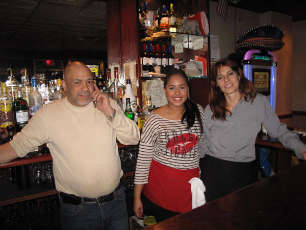 Photo by Clayton Patterson At El Sombrero, from left, Chico — the husband of Josephina Diaz, who co-owns the restaurant with her brother, Palmerio Fabian — Chico’s niece Stephane Fabian and Regina Bartkoff.