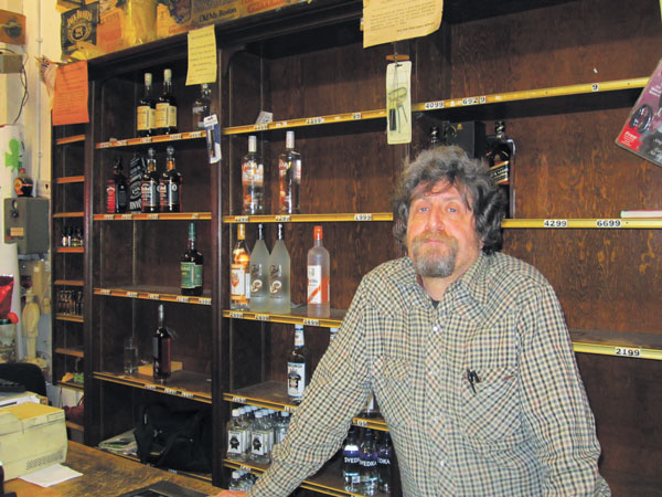 Photo by Lincoln Anderson Clift Arden, a manager at Washington Square Wines and Liquors, said the new rent N.Y.U. is asking for the space is prohibitively high. N.Y.U., however, said the store is already way behind on its rent.