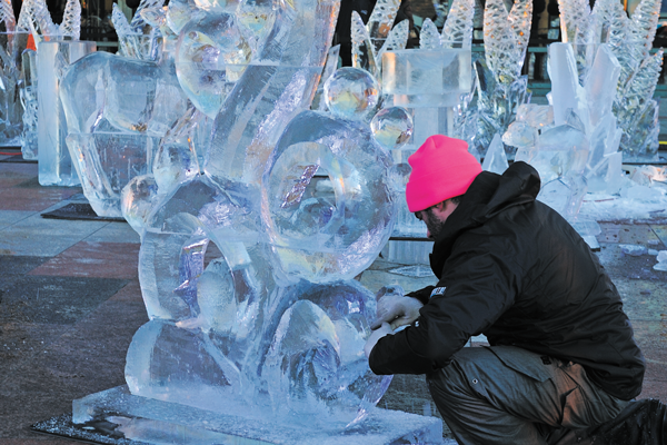 On Feb. 21 and Feb. 22, members of the Okamoto Studio demonstrated ice carving on the plaza next to the Winter Garden of what is now called “Brookfield Place” (formerly, the World Financial Center). The forest of ice sculptures was entitled “Fantastical Botanical.” Fortunately, the weather was cold so that the sculptures didn’t melt. Brookfield treated the audience to hot cups of chai tea and cupcakes.   Downtown Express photo by Terese Loeb Kreuzer 