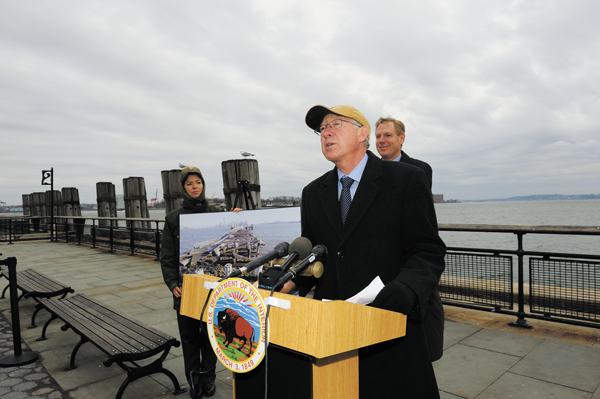 Downtown Express photo by Terese Loeb Kreuzer Secretary of the Interior Kenneth Salazar, speaking in Battery Park on Feb. 26, said Liberty Island could reopen before Ellis Isle, but he did not have a opening date for either. 