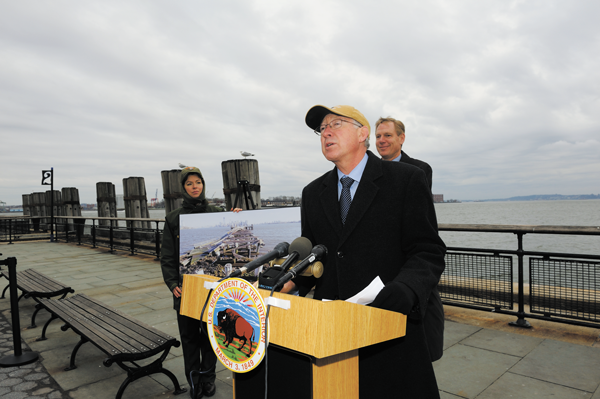 Lady Liberty and Ellis Island reopenings still uncertain 1 Downtown Express photo by Terese Loeb Kreuzer Secretary of the Interior Kenneth Salazar, speaking in Battery Park on Feb. 26, said Liberty Island could reopen before Ellis Isle, but he did not have a opening date for either.