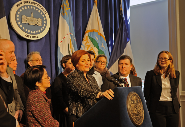Council Speaker Christine Quinn, center, announcing the Seaport food markets March 20. Downtown Express photo by Terese Loeb Kreuzer