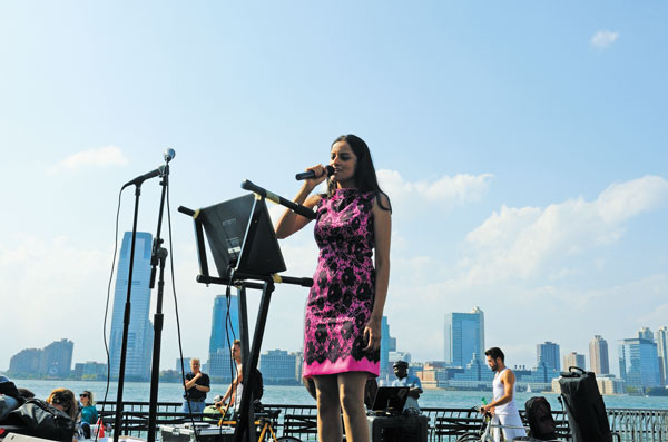 Jenifer Rajkumar singing last September for her neighbors at the annual Battery Park City block party.  File photo by Terese Loeb Kreuzer 