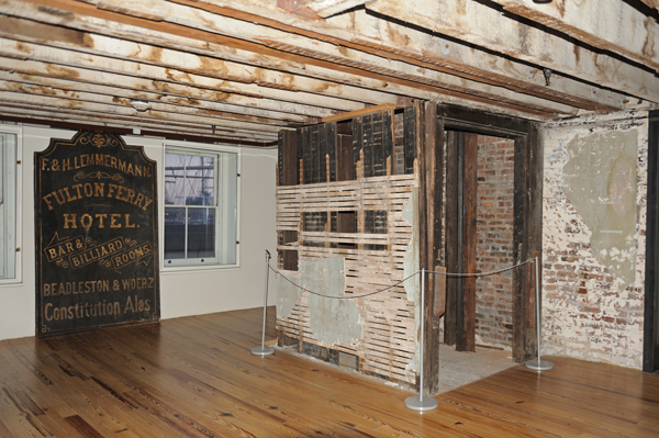 Photo by Terese Loeb Kreuzer The South Street Seaport Museum on Schermerhorn Row once housed several hotels for seamen. In 1952, the writer Joseph Mitchell and Louis Morino — who owned a restaurant called Sloppy Louie’s on this site (92 South St.) — used this old elevator shaft to enter the boarded-up Fulton Ferry Hotel (in operation from 1874 to 1935), where they found iron bedsteads, bureaus and a sign reading “All Gambling...Strictly Prohibited.”