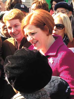 Christine Quinn campaigns with her sister, Ellen, left, in Inwood on March 10.   Photo by Gay City News 