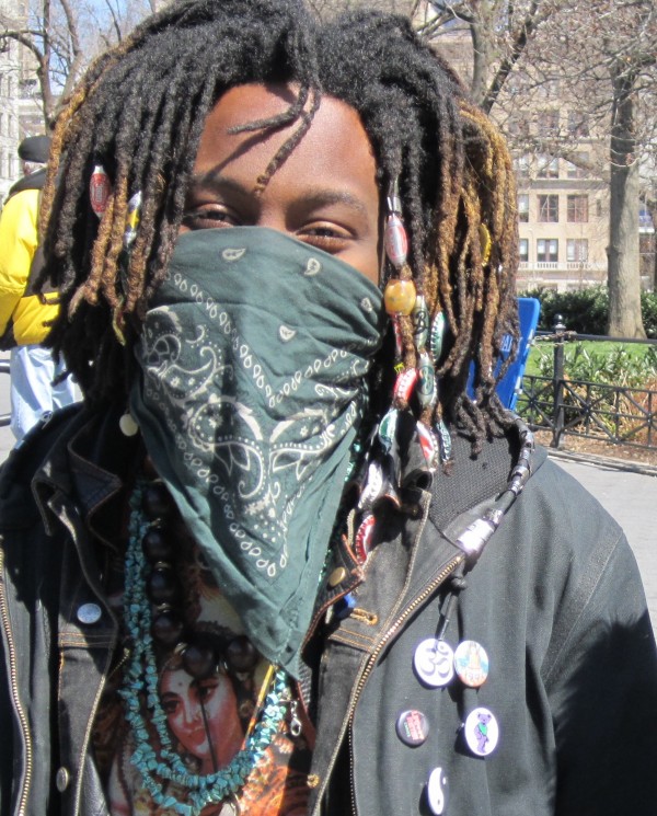 Tre agreed to pose for a photo with his bandanna covering his face.  Photo by Lincoln Anderson