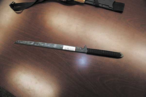 A samurai sword is displayed in the office of the Manhattan district attorney on Feb. 4, after a verdict was reached in the trial of Steven Johnson. The sword was part of the arsenal Johnson used during his rampage at the bar in 2002. 