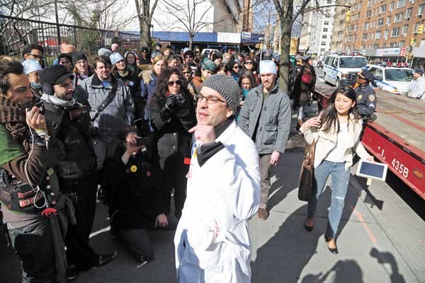 Danny Lugassy, an E.R. doctor and member of Healthcare for the 99%, addressed the crowd.  Photo by Jefferson Siegel 