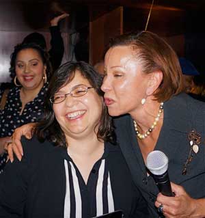 Above: Rosie Mendez gets an endorsement and a kiss from Congressmember Nydia Velazquez; MIDDLE,  Rosie with her older brother, Antonio, who is a doctor; BOTTOM,  former Councilmember Margarita Lopez, left, who was Mendez’s political mentor, and Amy Velez, a former school board member. Photos by Sarah Ferguson 