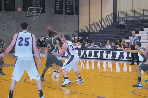 Photo by Daniel Jean-Lubin The Violets defended against New Jersey City’s offense, above, but they couldn’t find an answer for Khalid Muhammad’s lethal 3-pointers.