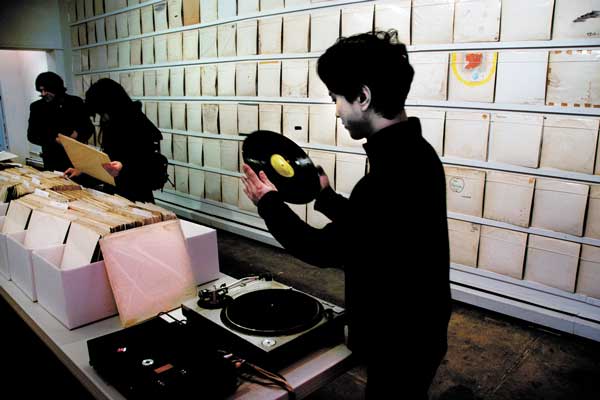Play it again, Rutherford; He wants ‘White Album’s 1 Photos by Bob Krasner Rutherford Chang recorded one of the hundreds of “White Album”s from his collection for a master disc he’s creating.