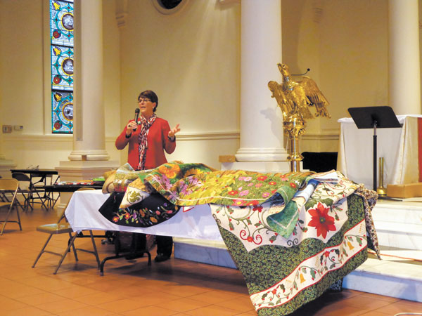 Empire Quilters Crafts a Pattern of Common Goals, Good Causes 1 Photos by Lakshmi Gandhi January’s guest speaker, Karen Kay Buckley, wows the crowd with her quilts (while passing on a few tips).