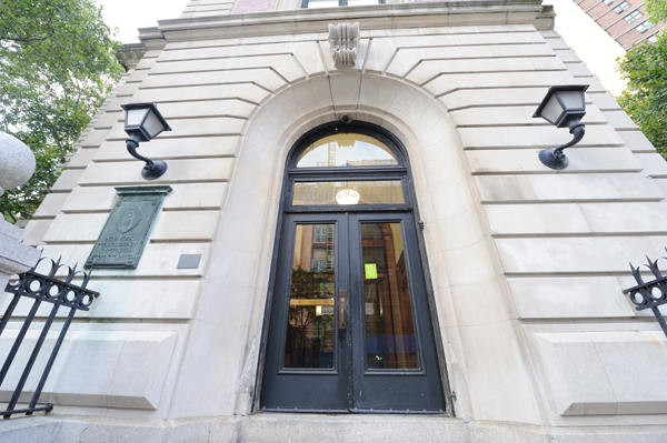 The entrance to the Seward Park Branch library at 192 East Broadway. A plaque next to the entrance notes that it was a gift from Andrew Carnegie. It opened on Nov. 11, 1909. (Photo: Terese Loeb Kreuzer)