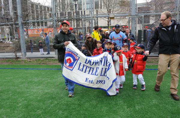 Downtown Little Leaguers marched onto the field for opening day ceremonies, April 7. Downtown Express photo by Terese Loeb Kreuzer