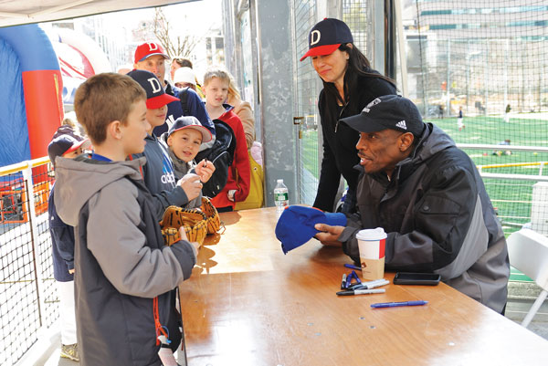 Assembly Speaker Sheldon Silver donned a Downtown Little League jersey Sunday; Dwight “Doc” Gooden, former Met ace and Yankee pitcher, signed autographs at the event. 