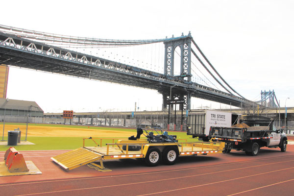 Work to reopen the Bergtraum ball field under the Manhattan Bridge began on Tuesday.  
