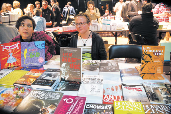 Some of the many booksellers at last weekend’s Anarchist Book Fair.  Photos by Jefferson Siegel  