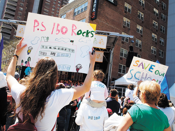 P.S. 150 parents and students showed their support for keeping the school Downtown at the Tribeca Film Festival's family fair earlier this year. Downtown Express file photo by Milo Hess