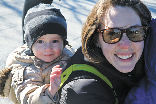 Photo by Tequila Minsky  A mom and a potential future Little Leaguer joined in on the hike and all the hoopla for Pier 40 on Saturday.