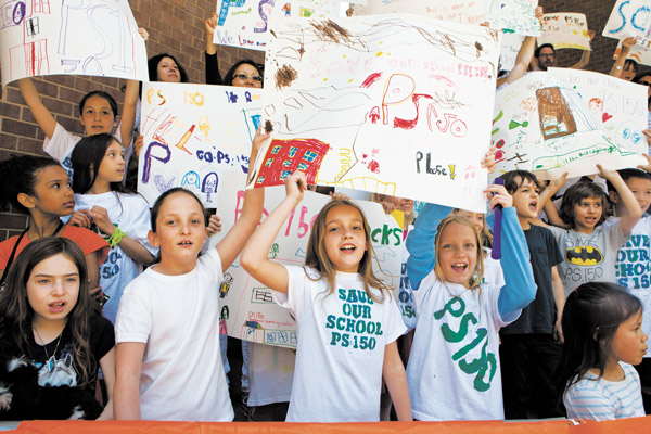 Photo by Jennifer Weisbord   PS150 families fight effort to evict school from Tribeca PS150 students chanted “save our school” Saturday at the Tribeca Film Festival’s family fair, which was near their entrance. The Dept. of Education has proposed moving the school to Chelsea.