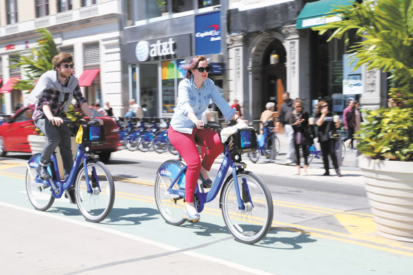 Citi Bike riders on the first day, May 27. Downtown Express file photo by Jefferson Siegel Citi Bike riders on the first day, May 27.